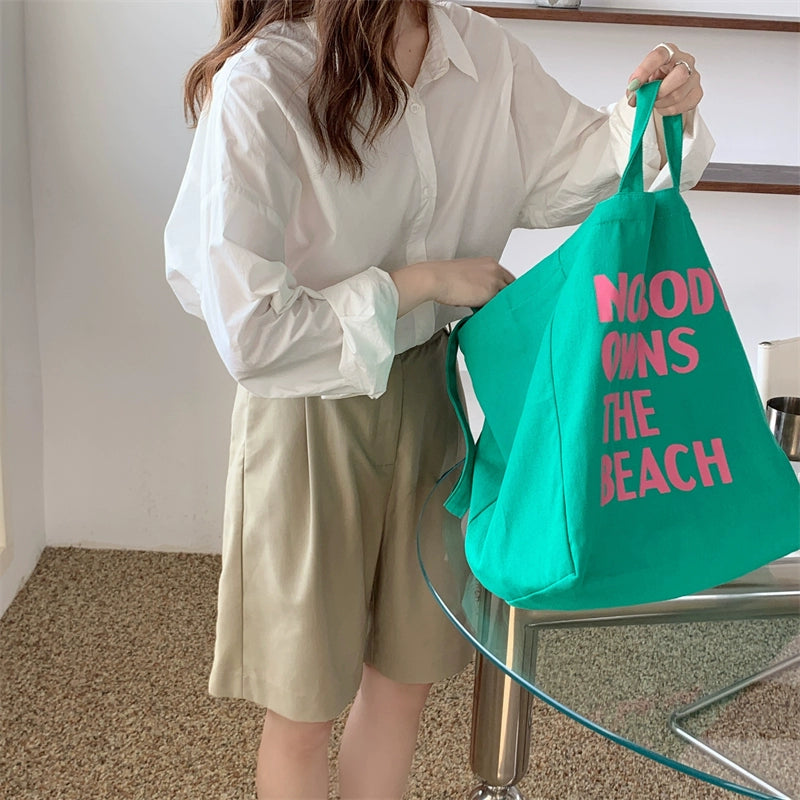 "NOBODY ONWS THE BEACH" Tote Bag