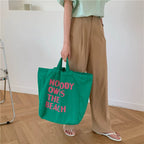 "NOBODY ONWS THE BEACH" Tote Bag