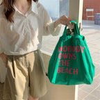 "NOBODY ONWS THE BEACH" Tote Bag