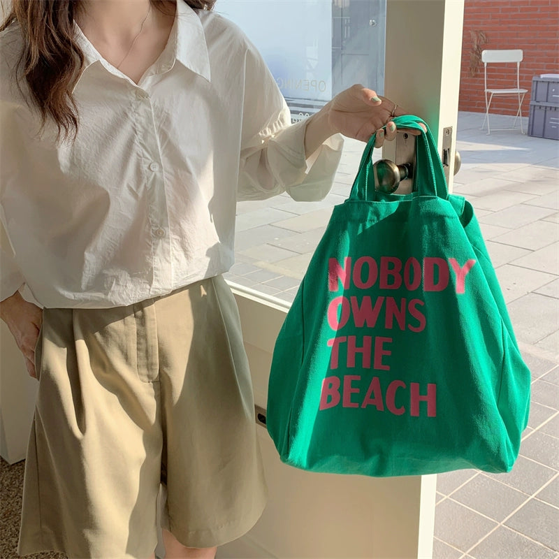 "NOBODY ONWS THE BEACH" Tote Bag