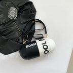 Capsule Crossbody Bag